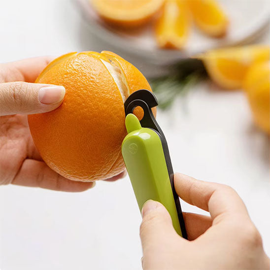 eplucheur agrume decoupe peau orange
