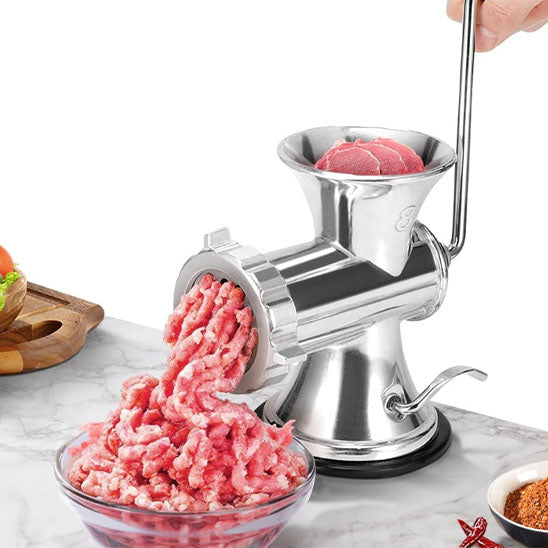 hachoir a viande pose sur un plan de travail