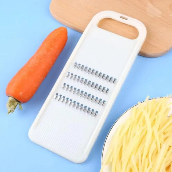 mandoline japonaise blanche avec carotte