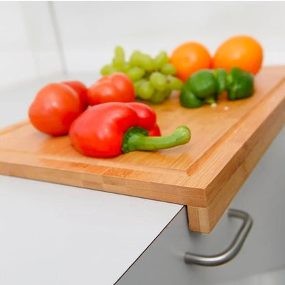 Planche a decouper bois legumes coupes