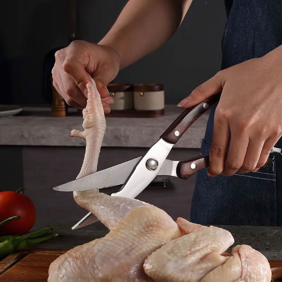 ciseau du set de couteaux de cuisine coupe patte de poulet