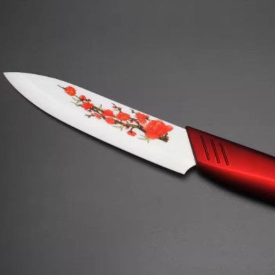 couteau en céramique manche rouge