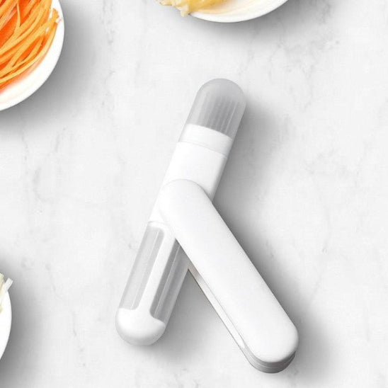 économe cuisine double sens