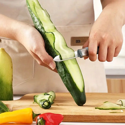 econome cuisine épluche concombre sur planche à découper