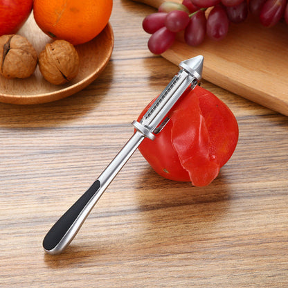 économe professionnel épluche tomate